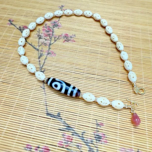Alternative view of Tibetan Two-Eye Dzi Bead Mixed Pure Ivory Necklace
