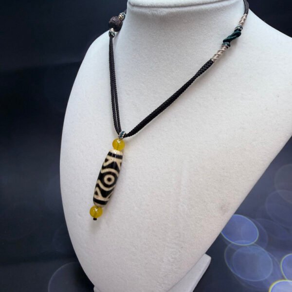 Alternative view of Three Eye Vajrayana Dzi Bead Pendant